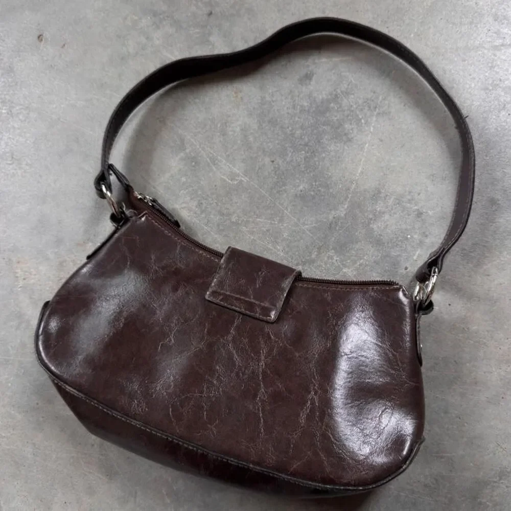 Brown faux leather y2k grunge bag with silver hardware studded details